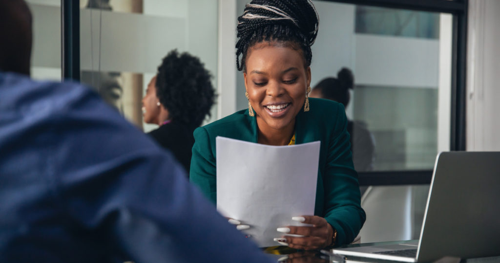 Nurse smiling during her travel nurse interview